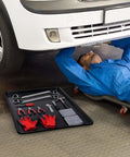Mechanic under car with Triple Pack Extra Large Oil Drip Pan 35.4 X 24 Inch Heavy Duty Plastic Drain Tray for Car Maintenance