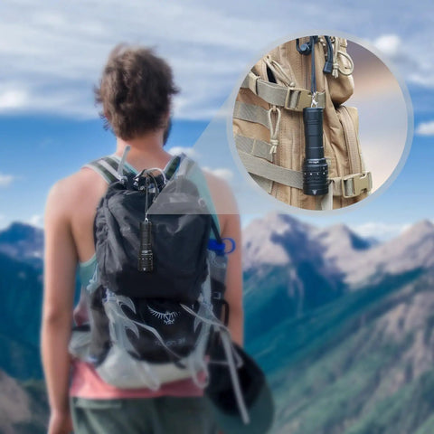 Ultra Bright 3000 Lumen Scuba Dive Light With Magnetic Ring Switch IPX8 Waterproof attached to a hiker's backpack
