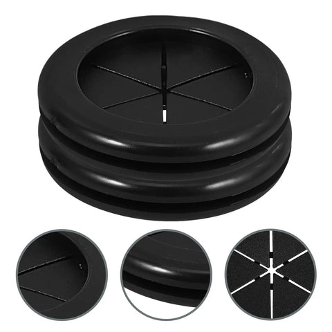 Black Rubber Grommet Kit For Cable Management With Dual Sided Buckle Design, Fire Resistant And Waterproof Desk Hole Cover For Office And Home Use, Includes Four Pieces. Black rubber desk grommet, side view.