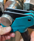 Close-up of Universal Thread Repair Tool And Restorer For All Threads In Range Five Eighths Inch To One And A Half Inches External Or Internal Threads Metric And SAE One Hand Tool Quick Sizing Chases And Repairs Threads in use on metal thread