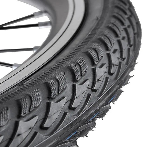 Close-up of 26 inch wheel from Turn Your Regular Bike Into a Street Ready E Bike With This 48V 1000W Front Hub Conversion Kit
