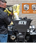 Beefy ATV Broadcast Spreader With Rain Cover, 100 Pound Capacity Poly Hopper, Rear Rack Mount, 12 Volt Motor, Spreads Seed Fertilizer Salt And Feed, All Season Use, Outdoor Lawn Care Gear For Your ATV in use, with man pouring material into hopper.