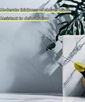 Curved Plastering Trowel With Stainless Steel Arc Blade For Drywall Spackle And Putty Applications, displayed on marble surface