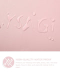 Focus on water droplets on the Pink Non Slip Leather Desk Pad With Waterproof Top For Laptop And Keyboard Large 23.6 By 13.7 Inches Anti Slip Back Suede Single Side Use Table Protector Mat And Blotter Pad For Office Home Decor