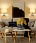 9.5 Inch Wall Lamp With USB Port And Dimmer, Plug In Cord Sconce With White Fabric Shade illuminating a cozy living room