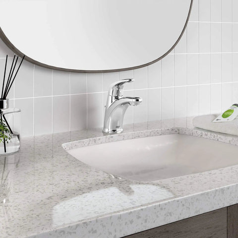 Colony Pro Single Handle Bathroom Faucet With 1.2 GPM Flow Polished Chrome on a modern countertop and backsplash