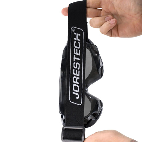 Side view of Anti Fog Wide Vision Safety Goggles With ANSI Z87 Certification And UV Eye Protection, adjustable strap shown