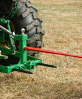 Dual Design Gooseneck Tractor Trailer Hitch With Hay Bale Spear Charcoal Frame Two Inch Receiver Mount And Two Five Sixteenth Inch Gooseneck Ball The Real Farm Workhorse For Three Point Attachments Heavy Duty Towing And Bale Handling Tool, mounted on tractor
