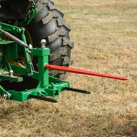 Dual Design Gooseneck Tractor Trailer Hitch With Hay Bale Spear Charcoal Frame Two Inch Receiver Mount And Two Five Sixteenth Inch Gooseneck Ball The Real Farm Workhorse For Three Point Attachments Heavy Duty Towing And Bale Handling Tool, mounted on tractor