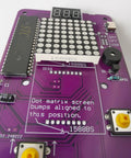 Circuit board with purple base and dot matrix, part of Noob Friendly Soldering Practice Kit For DIY Electronics Projects Learn To Solder With Detailed Circuit Schematics And Hands On STEM Education For Starters.