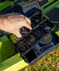 TracPak Tray Inserts 4x2 Half Depth, 2 Pack With Eight 2x2 Compartments Per Tray, shown organizing kayak tackle gear.