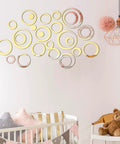 72 Piece Acrylic Circle Mirror Wall Stickers Set In Silver Black And Gold Removable Round Wall Decor Decals in a nursery room