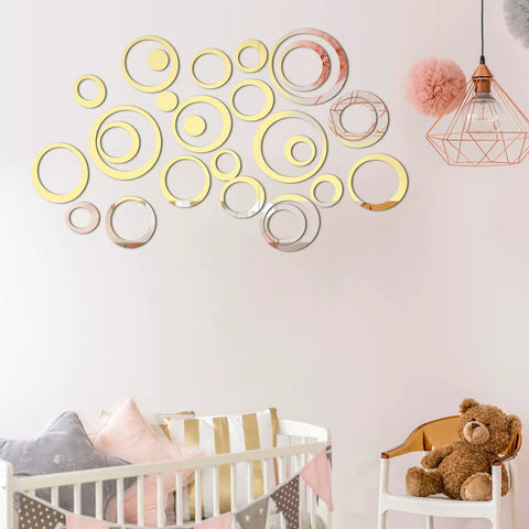 72 Piece Acrylic Circle Mirror Wall Stickers Set In Silver Black And Gold Removable Round Wall Decor Decals in a nursery room