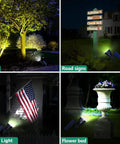 Bright Solar Spot Lights Outdoor Waterproof 18 LED 2 Mode Brightness Dusk Till Dawn Landscape Lighting illuminating a garden, road signs, flag, and flower bed
