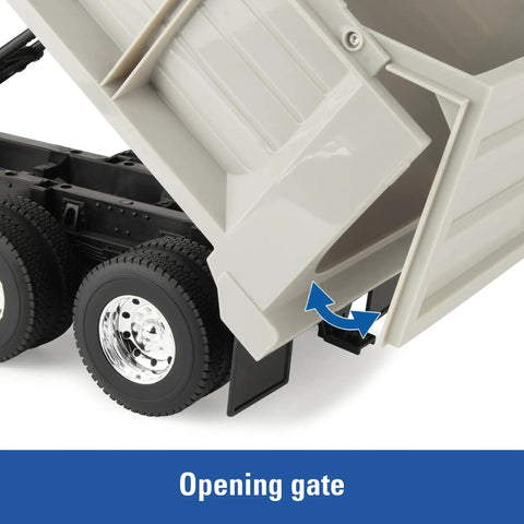 Close-up of Blue Peterbilt 1/16 Scale Dump Truck Toy with Working Dump Bed showing opening gate detail, 20 Inch Construction Vehicle.
