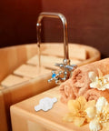 Portable Sauna Steamer Joint Hose Connector on wooden spa counter with towels and flowers, durable plastic replacement part