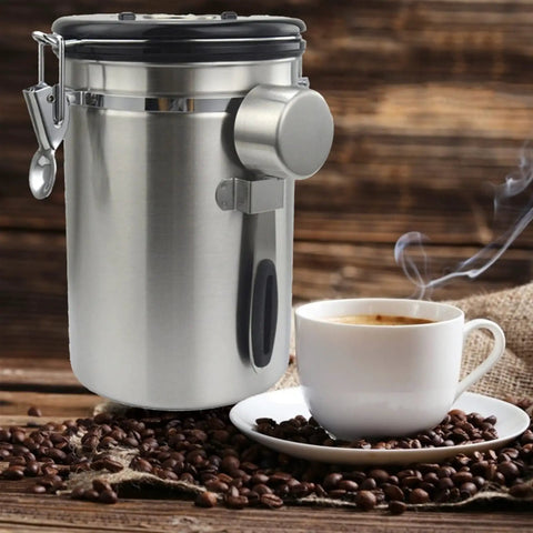 Stainless Steel Airtight Coffee Container Set With Scoop Keeps Your Daily Brew Snacks Cereal Flour Straight Up Crisp with coffee cup.