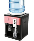 Hot And Cold Water Dispenser With One Click Start And Auto Temperature Control Three Temperature Settings Compact Desktop Electric Water Cooler For Home Office Dorm Bedside Use Pink with blue water bottle on top