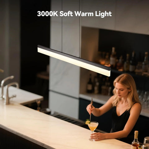 LED Linear Pendant Light 25W Black Hanging Bar Fixture illuminating a bar area with 3000K warm white light.
