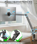 Magnetic Portable Monitor Arm With 360 Degree Swivel Heavy Duty Aluminum Desk Clamp 75 By 75 VESA Support holding a monitor