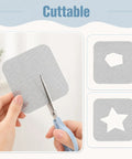 Person cutting a Heavy Duty Self Adhesive Mesh Window Screen Patch with scissors, showing its cuttable features.