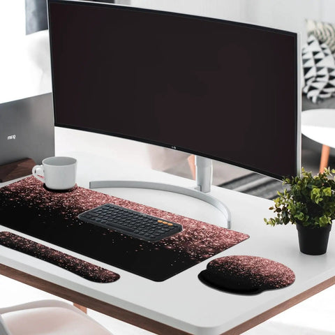 Rose Gold Pink 4-In-1 Keyboard And Mouse Pad Set With Large Desk Mat, Keyboard Wrist Rest, Mouse Wrist Rest, And Cup Coaster on a desk
