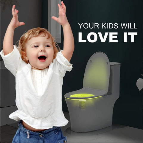 Child excited beside a toilet with Motion Sensor Toilet Night Light With Eight Color Changing Led Glow For Bathroom Hands Free Auto On In Darkness Perfect For Midnight Pee Energy Saving Nightlight Fun Gift For Family