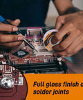 Person using Sn63 Pb37 Tin Lead Rosin Core Solder Wire, 1.0mm diameter, on a circuit board, spool label visible in hand.