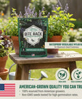 Garden Aromatic Herb Seed Kit For Mosquito Season With Six Seed Packets For Patio And Deck Includes Lavender Lemongrass Marigold Catnip Lemon Balm Basil And Six Coir Soil Discs package on wooden stool in garden