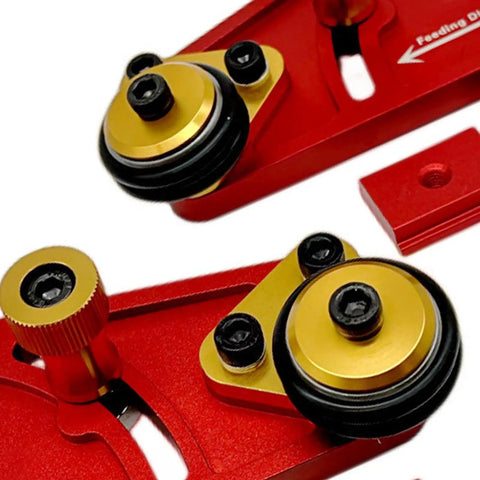 Close-up of Badass Adjustable Roller Featherboard Rock Solid Aluminum Woodworking Feed Guide with gold and black polyurethane wheels.
