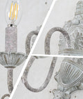 ZIRALIO Farmhouse Vintage Wall Sconce for Bedroom, 2-Pack close-up of intricate metalwork and bulb design.