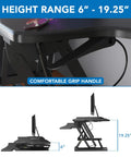 Standing Desk Converter 48 Inch Wide Sit Stand Desk Riser With Dual Gas Spring Handles, height shown with monitor setup