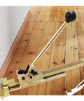 Pro Flooring Jack Tool for Quick Positioning and Gentle Lifts with non-slip handles on hardwood floor