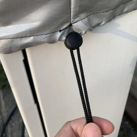 Close-up of adjustable drawstring and toggle on the Rock Solid Weatherproof Cover For Your EV Charging Station.