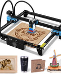 TTS-55 Pro Laser Engraver 5.5W DIY Laser Cutter With Air Assist, showing wood engraving alongside sample metal and acrylic items.