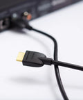 Close-up of 6ft 4K HDMI 2.0 Cable With Ethernet 18Gbps High Speed connecting to a device
