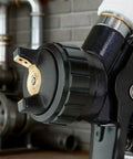 Close-up of Badass Aluminum Hvlp Spray Gun nozzle with precision tip for smooth coating and automotive painting.
