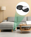 Heavy Duty Self Stick Furniture Sliders 24 Pack Black Eva Foam Felt Pads displayed on a couch, perfect for smooth furniture movement.