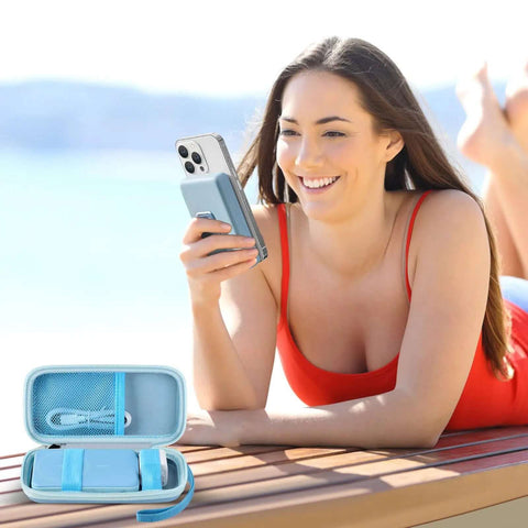 Slick Magnetic Battery Sleeve For Portable Chargers Provides Top Shelf Protection As A Foldable Power Bank Holder Case With Sweet Fit 10000 MAH Batteries Snug Shell Wrap Guard For Wireless Juice Boxes Keeps Carry Gear Fly, displayed with a smiling woman using a phone by the beach.