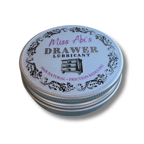 Heavy Duty Wood Drawer Wax And Premium Slide Lubricant That Gets Stubborn Cabinets Rolling Like Butter While Zapping Nagging Squeaks And Sticky Jams For Pure Frustration Free Home Maintenance Daily in a tin container.