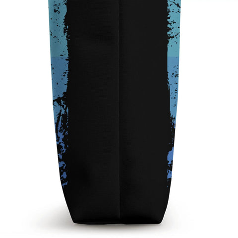 Side view of Dope Retro Wing Foil Wingsurfing Tote Bag for Men with Colorful Vintage Wingboarding Design on black canvas