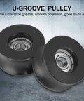 4 Pack U Groove Pulley Rollers With Overmolded Bearings, Plastic Sphere Wheels For Driving Doors And Mechanical Equipment, Durable And Smooth Operation For DIY Projects And Industrial Setups, black U-groove wheel close-up