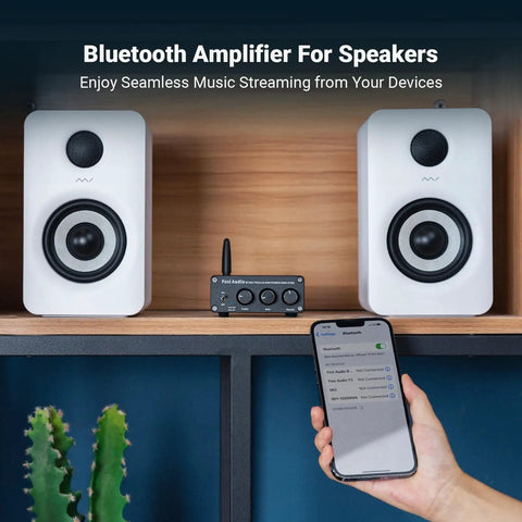 Bluetooth Stereo Amplifier 100W Per Channel, 2 Channel Class D Power Amp with smartphone, white speakers on shelf