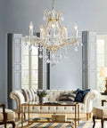 Gold 5 Light Maria Theresa Crystal Chandelier With Adjustable Chain Up To 52 Inches E12 Bulb Ready LED in a stylish living room