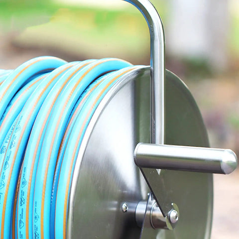 Close-up of Heavy Duty Portable Wall Mount Garden Hose Reel With Durable Stainless Steel Hand Crank and Blue Hose.