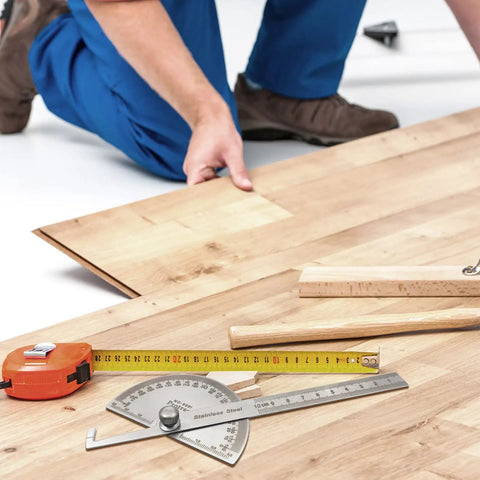 Rock Solid Stainless Steel Angle Protractor Ruler For Quick Carpenter Measurements And Construction Layouts on wood floor