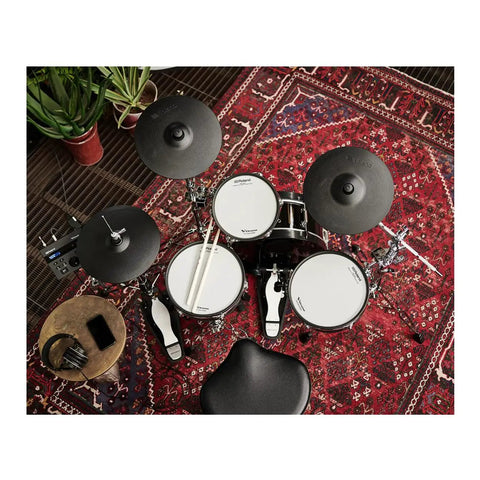 Top view of V Drums 4 Piece Electronic Drum Kit With Shallow Shells, TD 07 Module on a red rug, creating studio-quality grooves.
