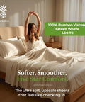 Luxurious Bamboo Viscose Sheet Set In Coconut Milk Fits Standard Split King Bed Frames, showcasing a woman enjoying the buttery smooth finish.