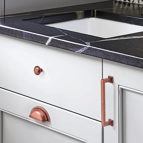 Installed 10 Pack 3 Inch Vintage Cup Pulls Antique Copper Cabinet Hardware on kitchen drawer, showing design and finish