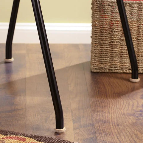 Secure Grip Formed Felt Furniture Pads Linen 1 Inch Cup Design on chair legs protecting hardwood floor